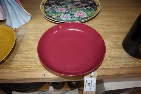 A Chinese ruby ground dish and a yellow dragon dish and two others largest diameter 26cm